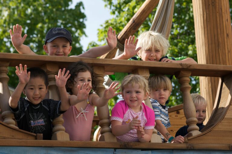 young children playing and laughing