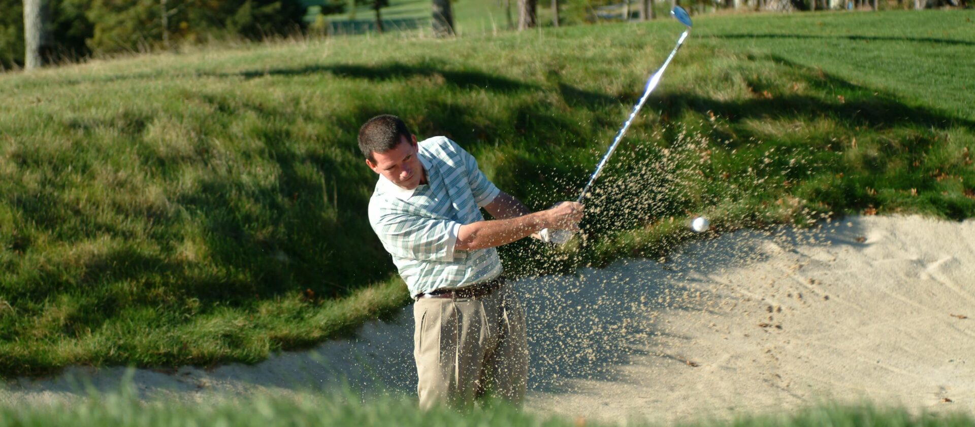 Jim Campbell sand trap action shot