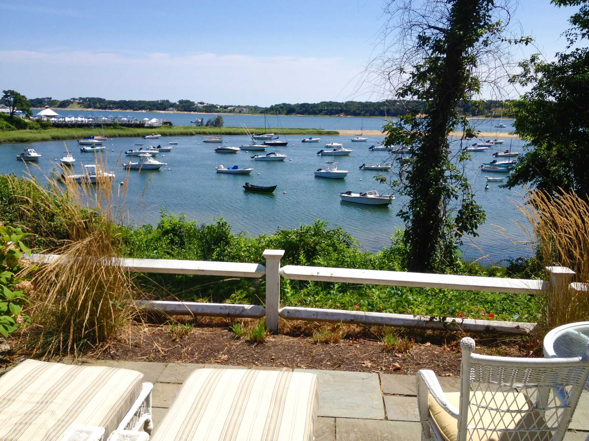 Premier Water View room overlooking the bay with boats on it.