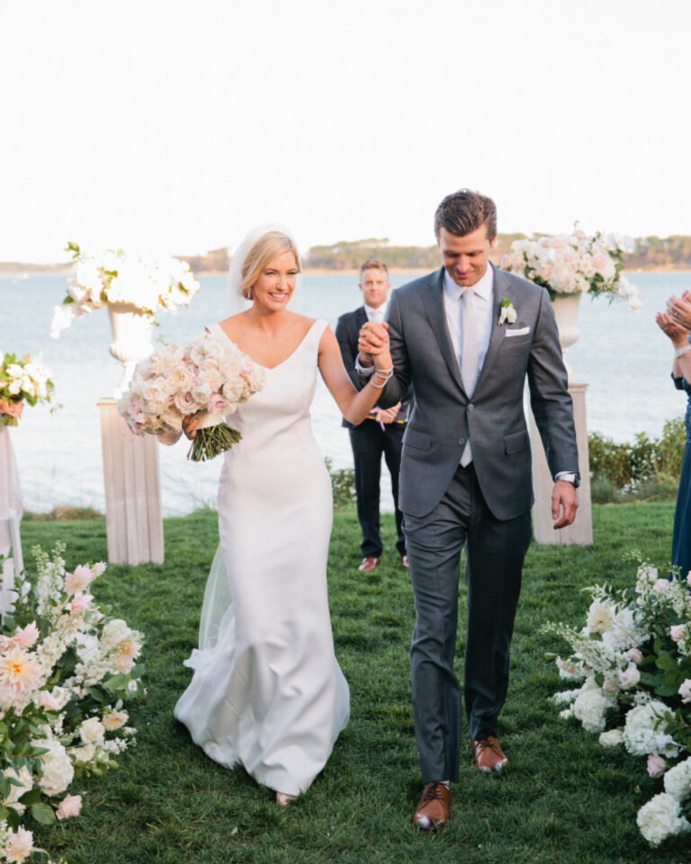Bride and groom walking.
