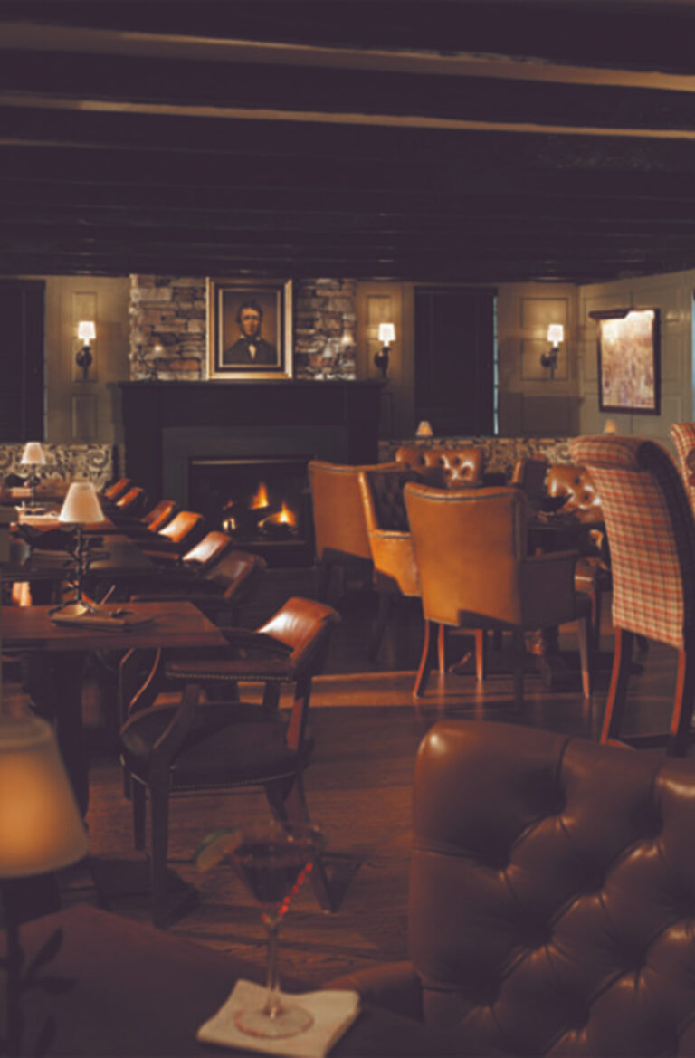 Dark bar with fireplace.