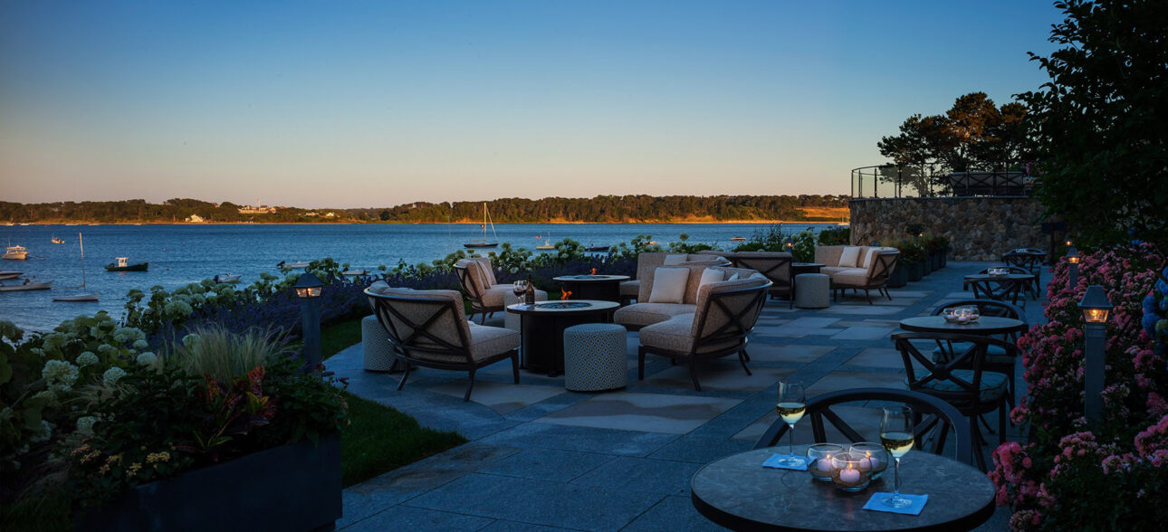 Sunset on bay with bonfires.