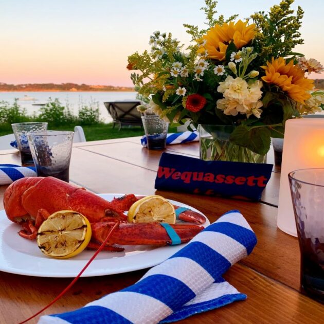 Wequassett resort lobster dinner on patio at sunset